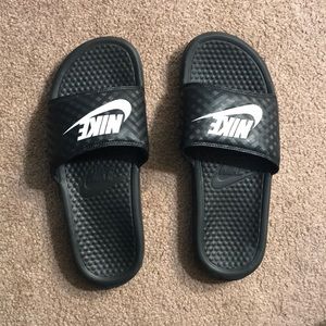 Nike slides.